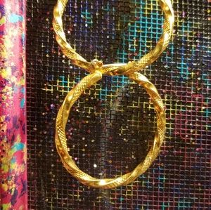 Pair gold tone hoop earrings